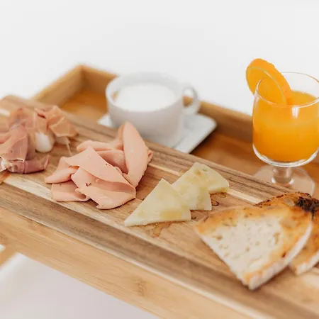 Couette-café Centoquindici Rooms&suite 4*