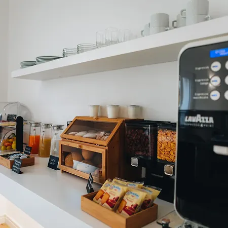 Centoquindici Rooms&suite Couette-café 4*