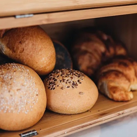 Centoquindici Rooms&suite Couette-café 4*